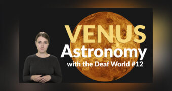 In the foreground, on the left, sign language interpreter Nikola Sliwa. On the right in the background is a large photo of the planet Venus. In the foreground a yellow and white caption: 
